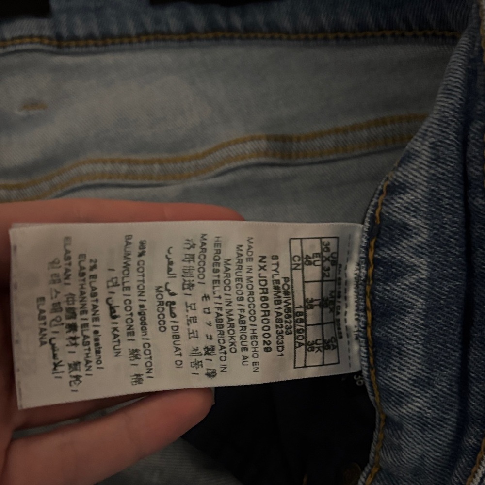 Guess Men's Slim Tapered Distressed Jeans in Faded Blue Wash - Picture 7 of 9